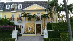 Luxury home holiday decorations with palm trees by Christmas Decor in Boynton Beach