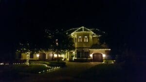 Elegant roofline and landscape Christmas lighting by Christmas Decor in Boynton Beach